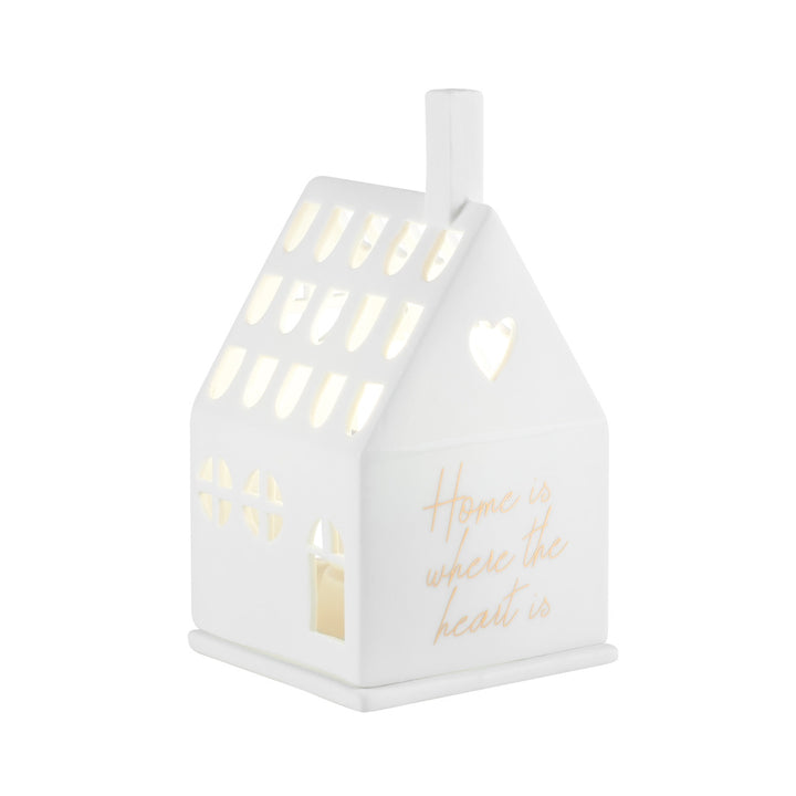 photophore en porcelaine en forme de maison, face avec inscription dorée: home is where the heart is