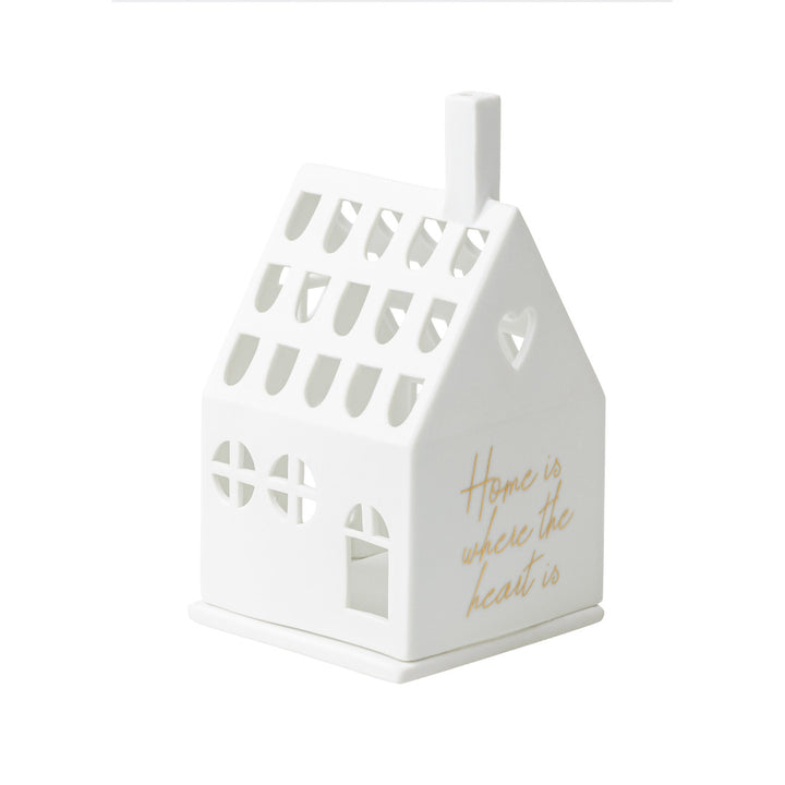 photophore en porcelaine en forme de maison, face avec inscription dorée: home is where the heart is, côté avec fenêtres ajourées