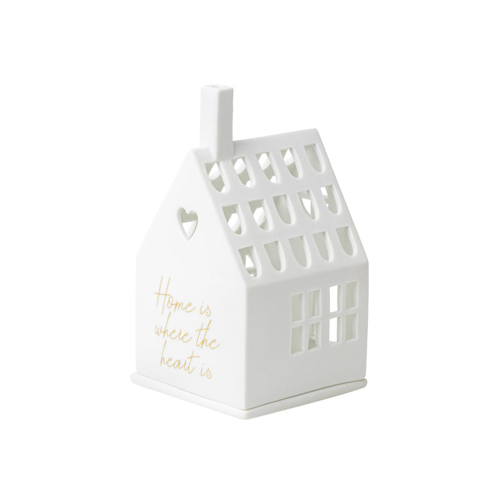 photophore en porcelaine en forme de maison, face avec inscription dorée: home is where the heart is, face fenêtres et tuiles