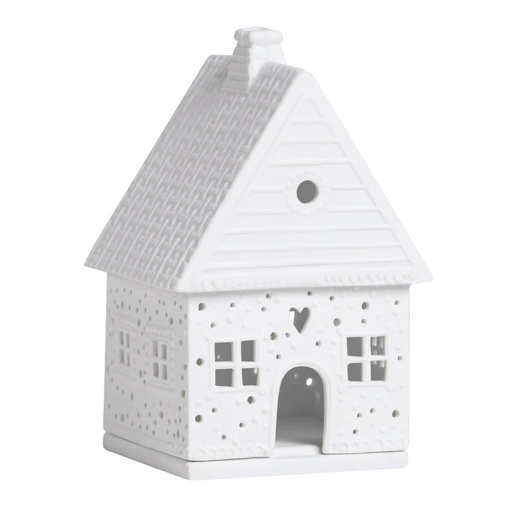 photophore en porcelaine représentant une petite maison en pain d'épices