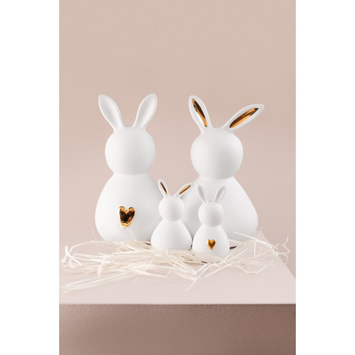 lapins en porcelaine blanche avec coeur doré sur le ventre  ou oreilles dorées 4avril